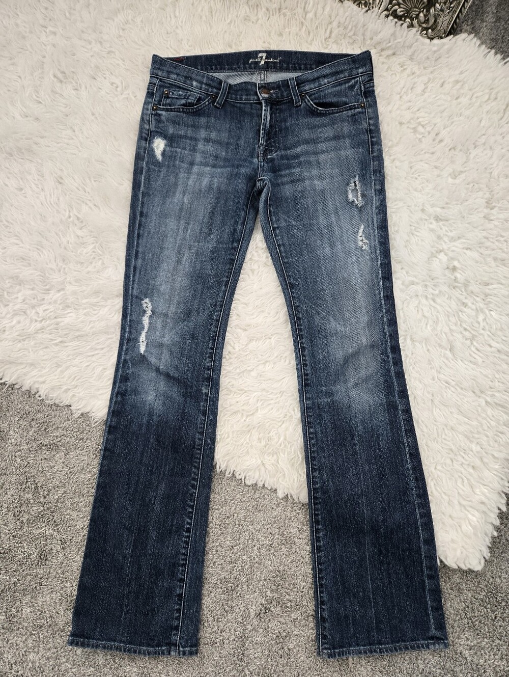 7 For All Mankind low rise distressed bootcut jeans. Size 29.